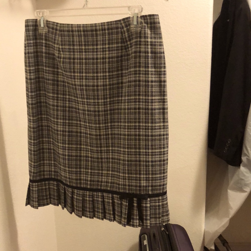 Women’s blazer and skirt suits two piece.